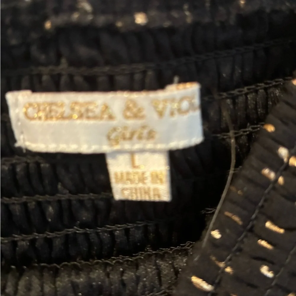 Chelsea & Violet Black and Gold Smocked Blouse